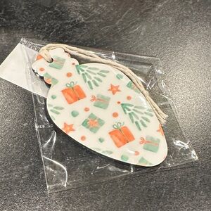 Festive Ornament with Gift and Tree Design